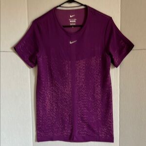 Nike women’s DRI-FIT ADV short-sleeve Aura top, slim fit, purple, size L